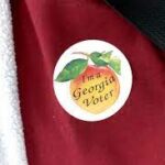 Georgia smashes records on first day of early voting as GOP hand-counting rule blocked by judge